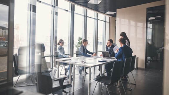 View of people sitting in meeting room