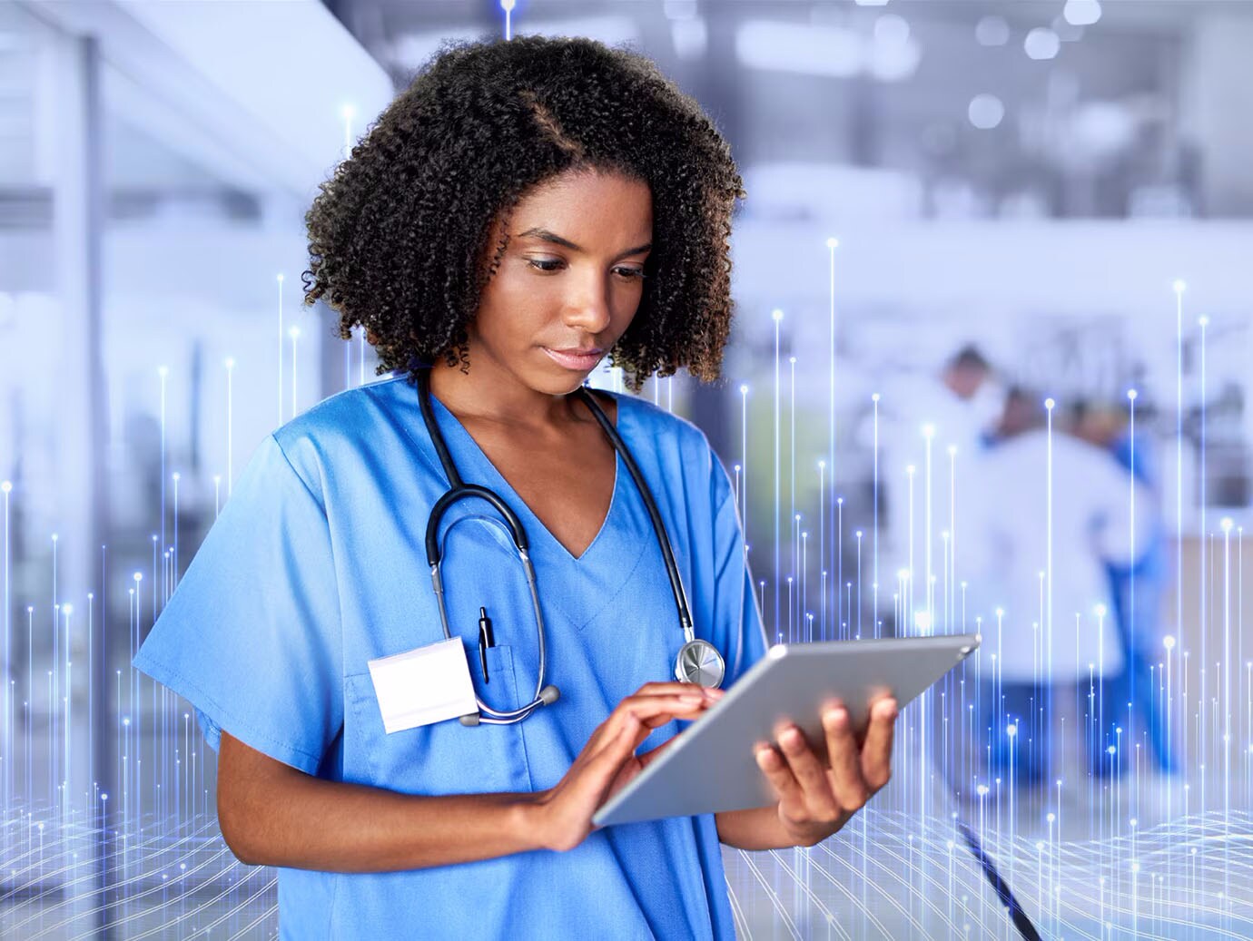 A lady doctor doing something on tab
